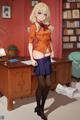 A woman in a school uniform standing in front of a desk.