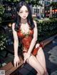 A woman in a red bathing suit sitting on a bench.